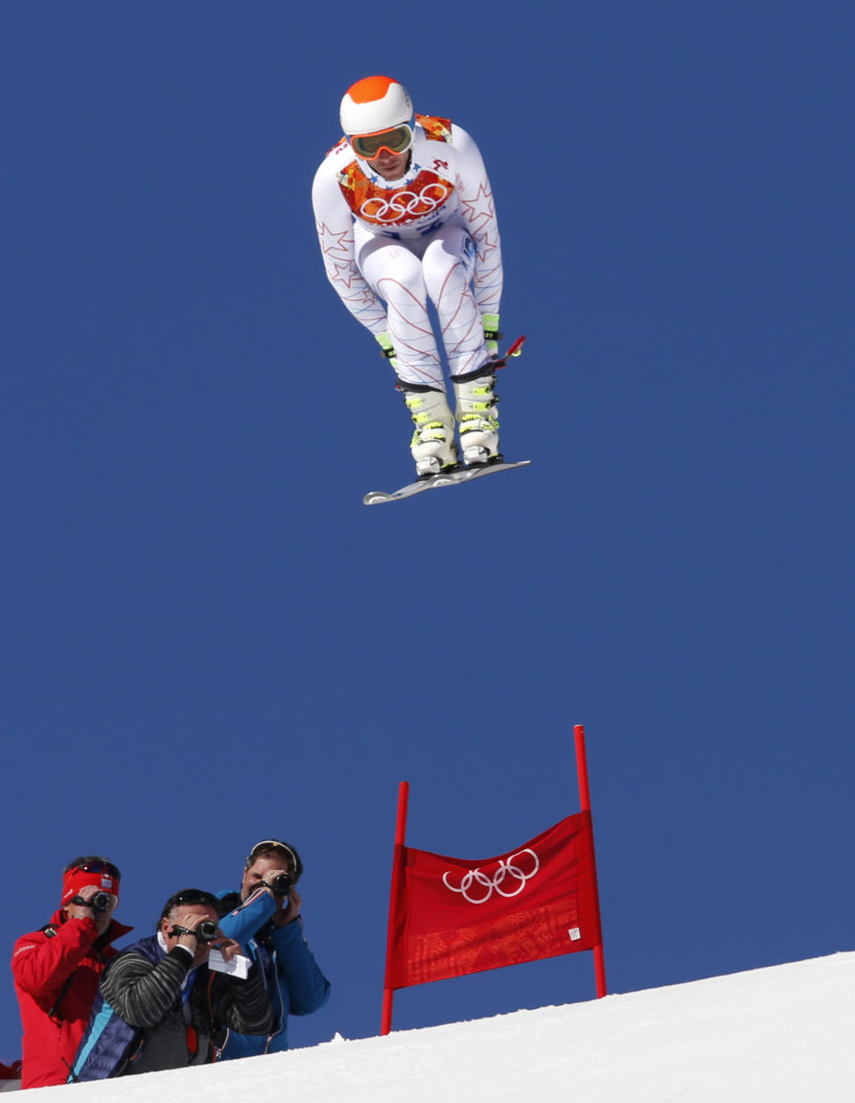 United States' Bode Miller makes a jump during a men's downhill training run for the Sochi 2014 Winter Olympics, Saturday, Feb. 8, 2014, in Krasnaya Polyana, Russia. (AP Photo)