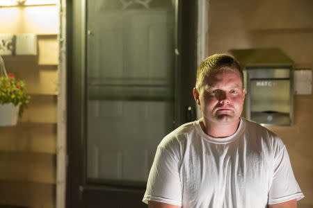 Brian Moody, a former Belle Terre rehab resident and now a college student pursuing a second degree, poses for a portrait outside of his home in Niagara Falls, New York August 29, 2015. REUTERS/Brett Carlsen