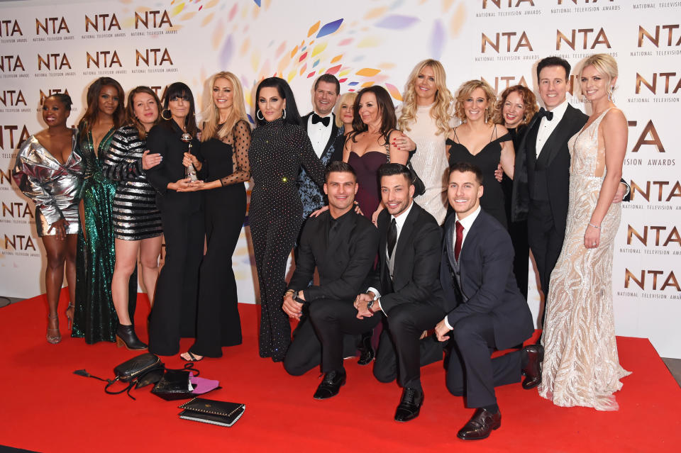 LONDON, ENGLAND - JANUARY 28: Motsi Mabuse, Oti Mabuse, Claudia Winkleman, Tess Daly, Michelle Visage, Aljaz Skorjanec, Giovanni Pernice, Gorka Marquez, Anton du Beke and Nadiya Bychkova, accepting the Best Talent Show for &quot;Strictly Come Dancing&quot;, pose in the winners room at the National Television Awards 2020 at The O2 Arena on January 28, 2020 in London, England. (Photo by David M. Benett/Dave Benett/Getty Images)