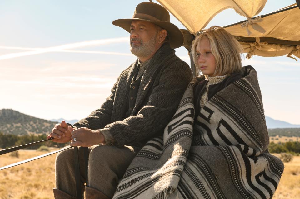 Tom Hanks plays a Civil War veteran taking a 10-year-old girl (Helena Zengel) back home in "News of the World."