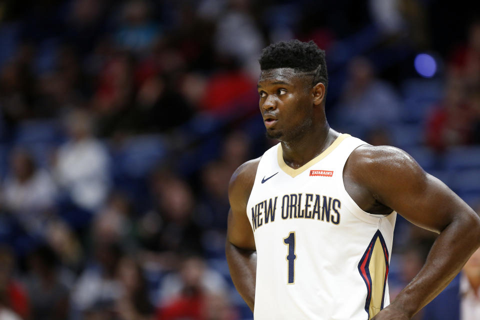 New Orleans Pelicans forward Zion Williamson (1) waits for play to resume in the first half of a preseason NBA basketball game against the Utah Jazz in New Orleans, Friday, Oct. 11, 2019. (AP Photo/Tyler Kaufman)