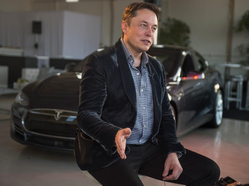 Tesla CEO Elon Musk at an event for Tesla owners and the media at Hawthorne Airport on September 9, 2014.