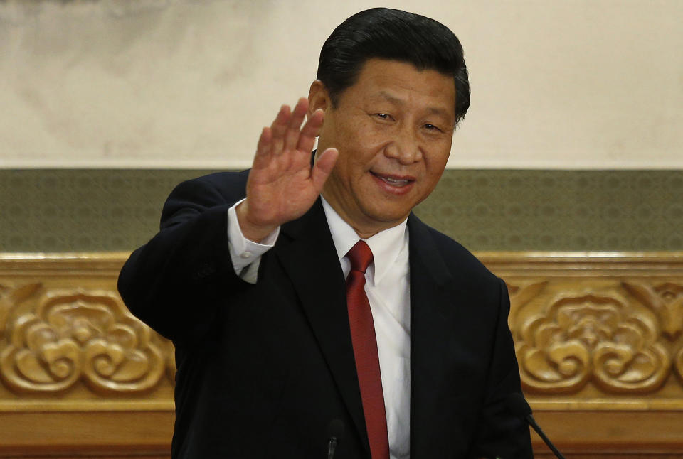 FILE - New Communist Party General Secretary Xi Jinping waves in Beijing's Great Hall of the People on Nov. 15, 2012. When Xi Jinping came to power in 2012, it wasn't clear what kind of leader he would be. His low-key persona during a steady rise through the ranks of the Communist Party gave no hint that he would evolve into one of modern China's most dominant leaders, or that he would put the economically and militarily ascendant country on a collision course with the U.S.-led international order. (AP Photo/Vincent Yu, File)