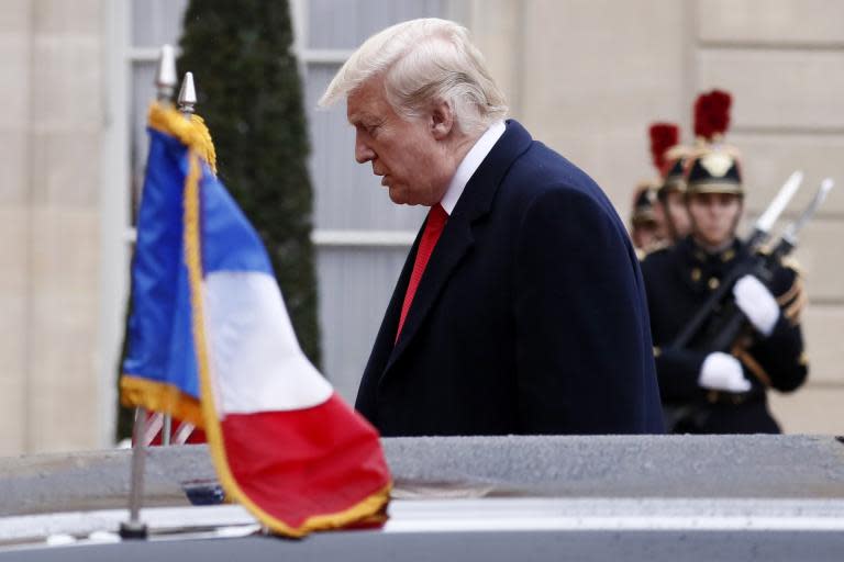 Trump condemned for missing Armistice ceremony at US cemetery because of ‘poor weather’