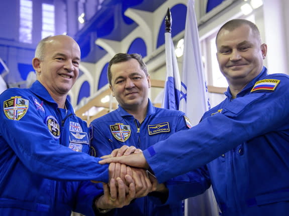 American astronaut Jeff Williams and Russian cosmonauts Oleg Skripochka and Alexei Ovchinin launched to the International Space Station March 18 from the Baikonur Cosmodrome in Kazakhstan. Here, they posed bef