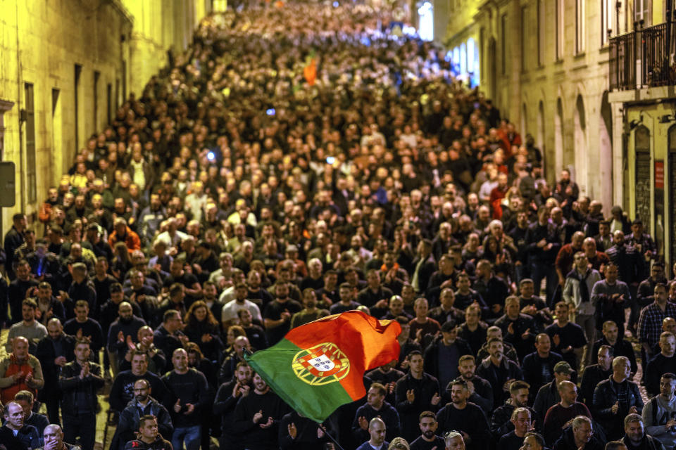 FILE - Demonstrators attend a protest by police professional associations demanding better salaries and work conditions in Lisbon, Portugal, Jan. 24, 2024. Corruption scandals have cast a shadow over Portugal's March 10 snap election. They have also fed public disenchantment with the country's political class. A housing crisis, persistent levels of low pay and unreliable public health services are other areas where the records of the two main parties are at issue. (AP Photo/Armando Franca, File)