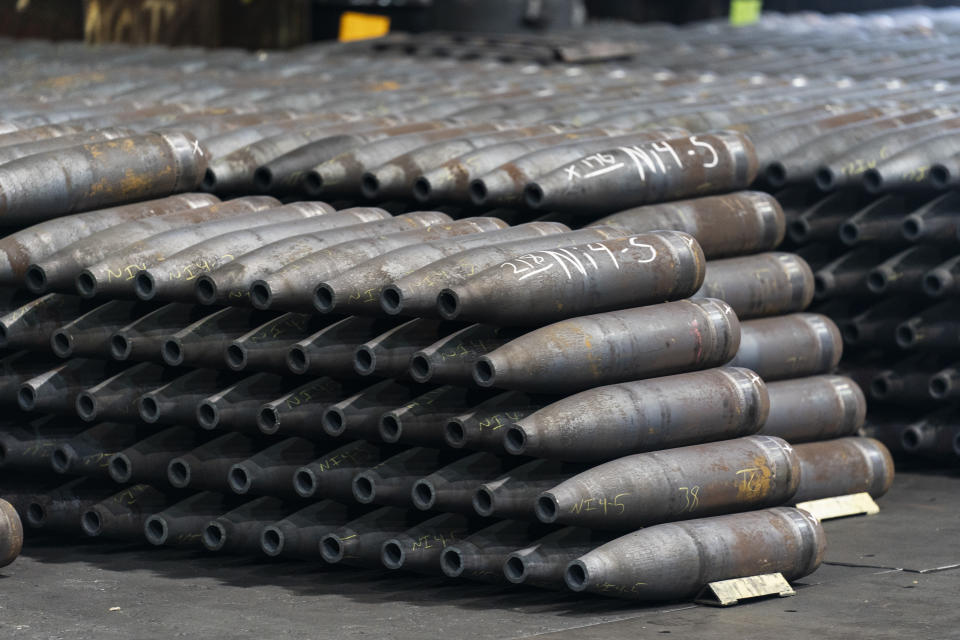 155 mm M795 artillery projectiles are stacked during manufacturing process at the Scranton Army Ammunition Plant in Scranton, Pa., Thursday, April 13, 2023. One of the most important munitions of the Ukraine war comes from a historic factory in this city built by coal barons, where tons of steel rods are brought in by train to be forged into the artillery shells Kyiv can’t get enough of — and that the U.S. can’t produce fast enough. (AP Photo/Matt Rourke)