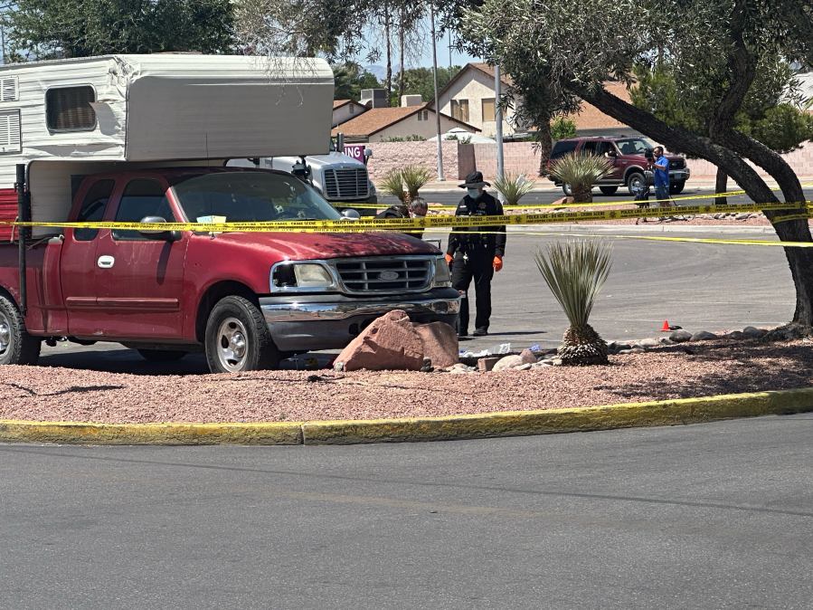 Police investigate scene of a double-shooting in southeast Las Vegas Tuesday. (KLAS/Joshua Peguero)
