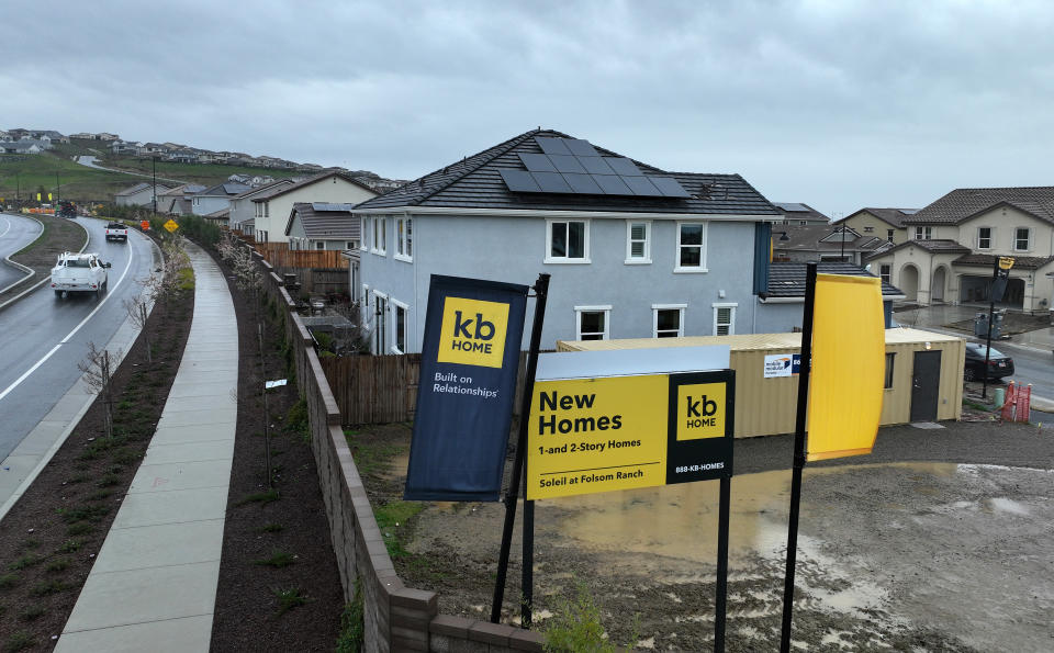 FOLSOM, CALIFORNIA - MARCH 22: In an aerial view, a sign is posted in front of a KB Home housing development on March 22, 2023 in Folsom, California. Homebuilder KB Home will report first quarter earnings today after the closing bell. (Photo by Justin Sullivan/Getty Images)