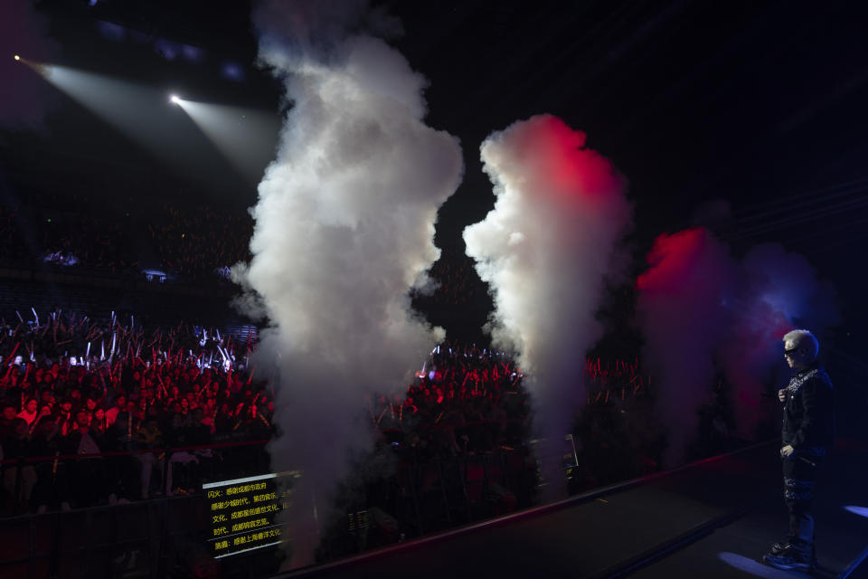 Chinese rapper Boss X performs at a concert in Chengdu in southwestern China's Sichuan province, Saturday, March 16, 2024. The rapper, who had come up from making music in a run-down apartment in an old residential community in the city, was now playing to a stadium of thousands. (AP Photo/Ng Han Guan)