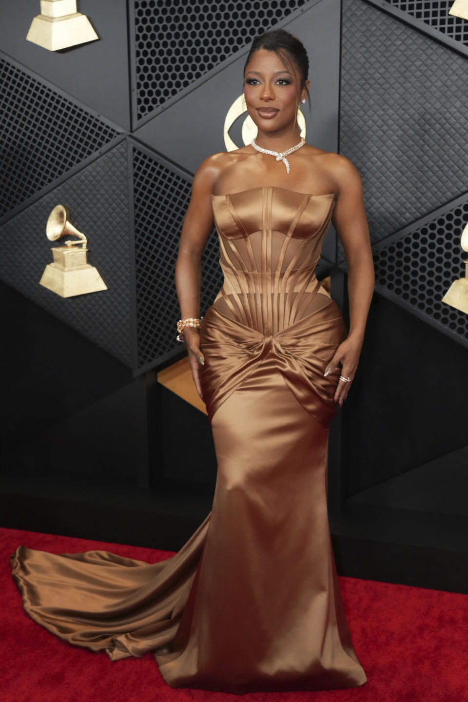 Victoria Monet arrives at the 66th annual Grammy Awards on Sunday, Feb. 4, 2024, in Los Angeles. (Photo by Jordan Strauss/Invision/AP)