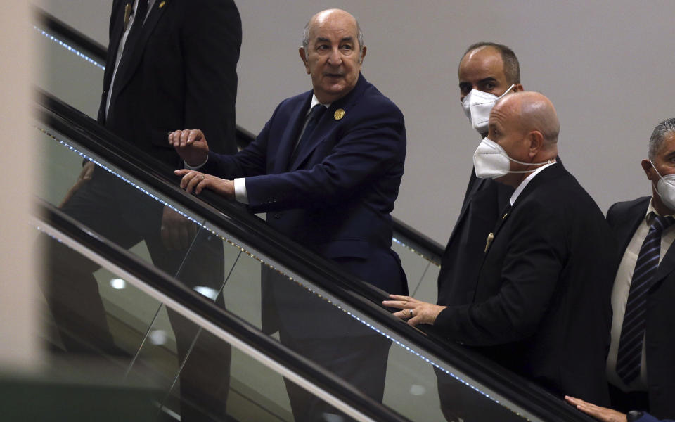 Algerian president Abdelmadjid Tebboune, centre, arrives to attend the Arab Summit, in Algiers, Algeria, Tuesday, 1 Nov., 2022. Arab leaders are meeting in Algeria at the 31st summit of the Arab League. They're seeking common ground on divisive issues in the region with the backdrop of rising inflation, food and energy shortages, drought and soaring cost of living across the Middle East and Africa. The 22-member League last held its summit in 2019. (AP Photo/Anis Belghoul)