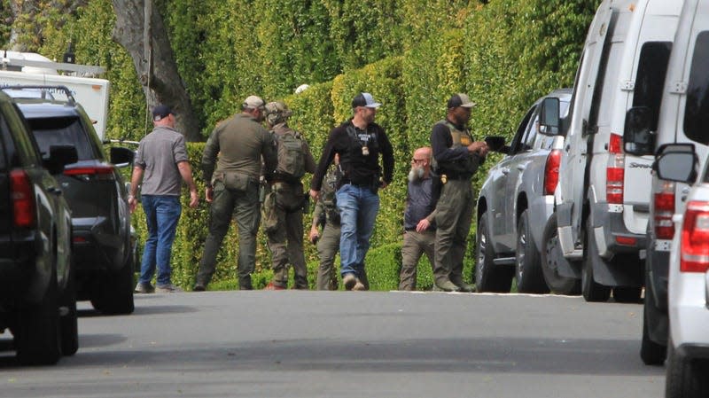 BEVERLY HILLS, CA - MARCH 25: Law enforcement agents are seen during a raid of Sean “Diddy” Combs’ home on March 25, 2024 in Beverly Hills, California. - Photo: MEGA/GC Images (Getty Images)