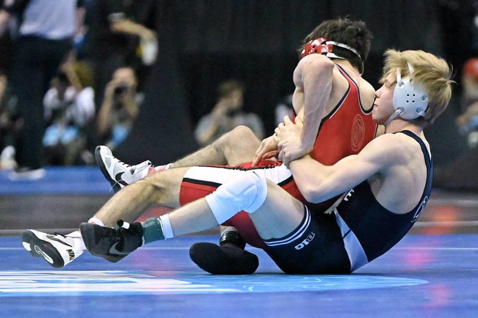 Penn State’s Braeden Davis attempts to keep Cornell’s Brett Ungar from escaping in their 125 pounds second round match of the NCAA Championships on Thursday, March 21, 2024 at TMobile Center in Kansas City, Mo. Davis topped Ungar, 2-1.