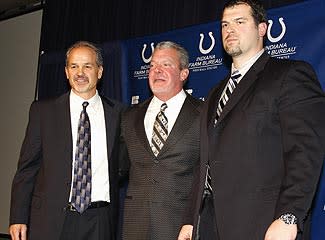 The new Colts regime features head coach Chuck Pagano, left, and GM Ryan Grigson, far right