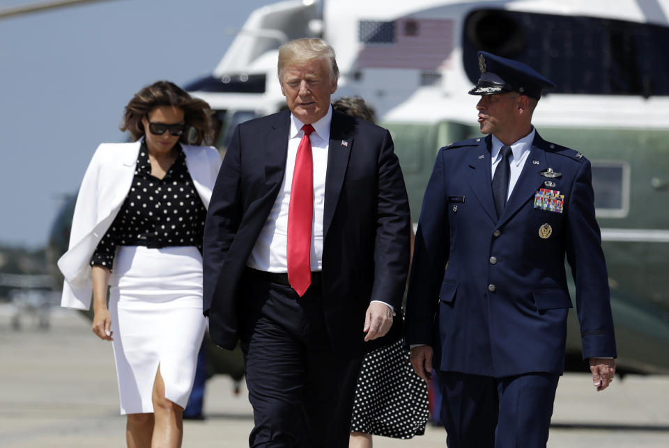 President Donald Trump and first lady Melania Trump walk to board Air Force One for a trip to Columbus, Ohio to visit the National Children's Hospital, and to speak at the Ohio Republican State Party dinner, Friday, Aug. 24, 2018, in Andrews Air Force Base, Md. (AP Photo/Evan Vucci)