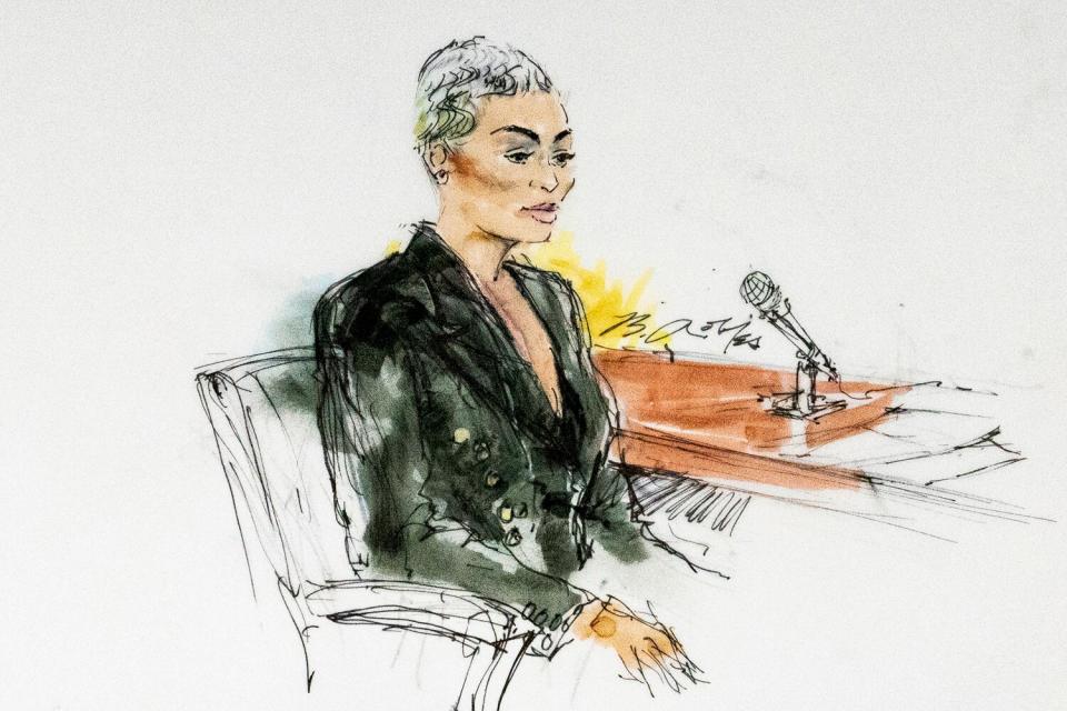 In this courtroom artist sketch, former reality television star Blac Chyna sits in court in Los Angeles