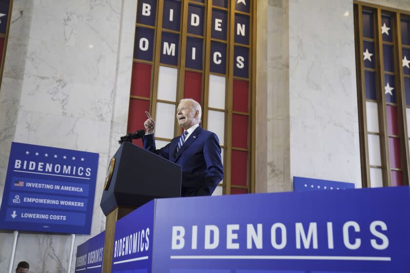 FILE - President Joe Biden delivers remarks on the economy, Wednesday, June 28, 2023, at the Old Post Office in Chicago. Biden has long struggled to neatly summarize his sprawling economic vision. On Wednesday, the president gave a speech on "Bidenomics" in the hopes that the term will lodge in voters' brains ahead of the 2024 elections. But what is Bidenomics? Let's just say the White House definition is different from the Republican one — evidence that catchphrases can be double-edged. (AP Photo/Evan Vucci, File)