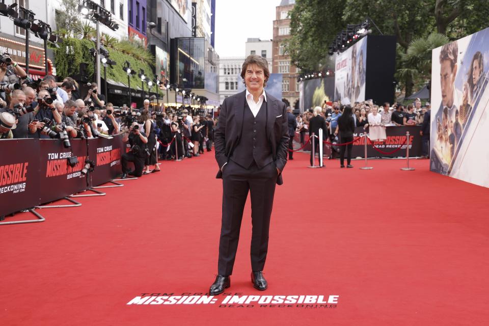 Tom Cruise poses for photographers upon arrival at the premiere of the film 'Mission: Impossible - Dead Reckoning Part One' on Thursday, June 22, 2023 in London. (Vianney Le Caer/Invision/AP)