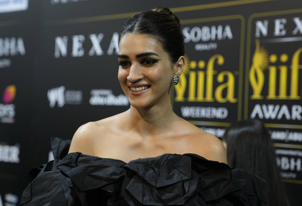 Bollywood actress Kriti Sanon arrives to attend the 23rd International Indian Film Academy (IIFA) awards In Abu Dhabi, United Arab Emirates, Friday, May 26, 2023. (AP Photo/Kamran Jebreili)