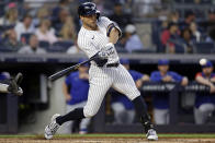 New York Yankees' Giancarlo Stanton hits a home run during the fourth inning of the team's baseball game against the Chicago Cubs on Saturday, June 11, 2022, in New York. (AP Photo/Adam Hunger)