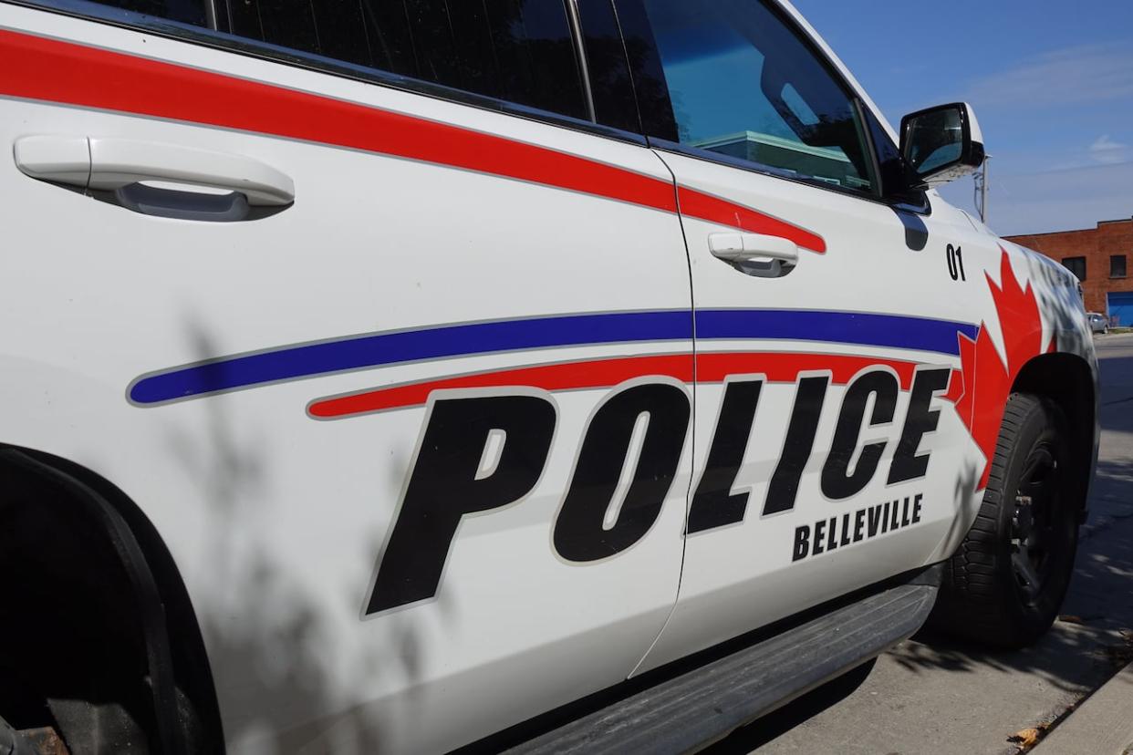 Belleville police have charged a man with second-degree murder after finding a woman dead in a home early Tuesday morning. (Dan Taekema/CBC - image credit)