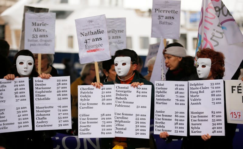 People attend a demonstration against femicide and violence against women in Marseill