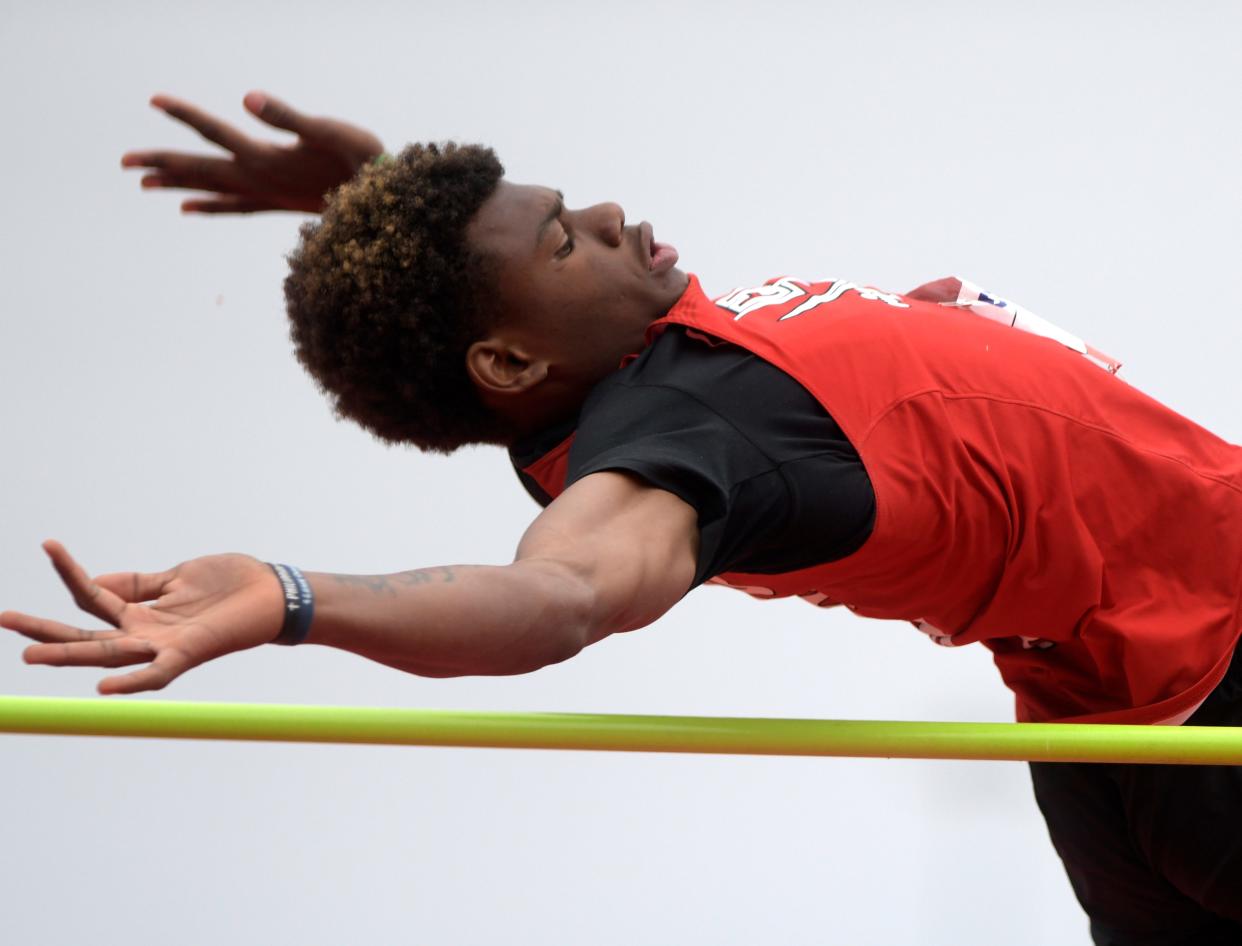 Lubbock-Cooper's Michael Dever competes in high jump during the Region I-5A track and field meets, Friday, April 19, 2024, at Lowrey Field.