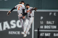Baltimore Orioles' Gunnar Henderson (2) and Colton Cowser (17) celebrate after the team's win over the Boston Red Sox in a baseball game Thursday, April 11, 2024, in Boston. (AP Photo/Charles Krupa)