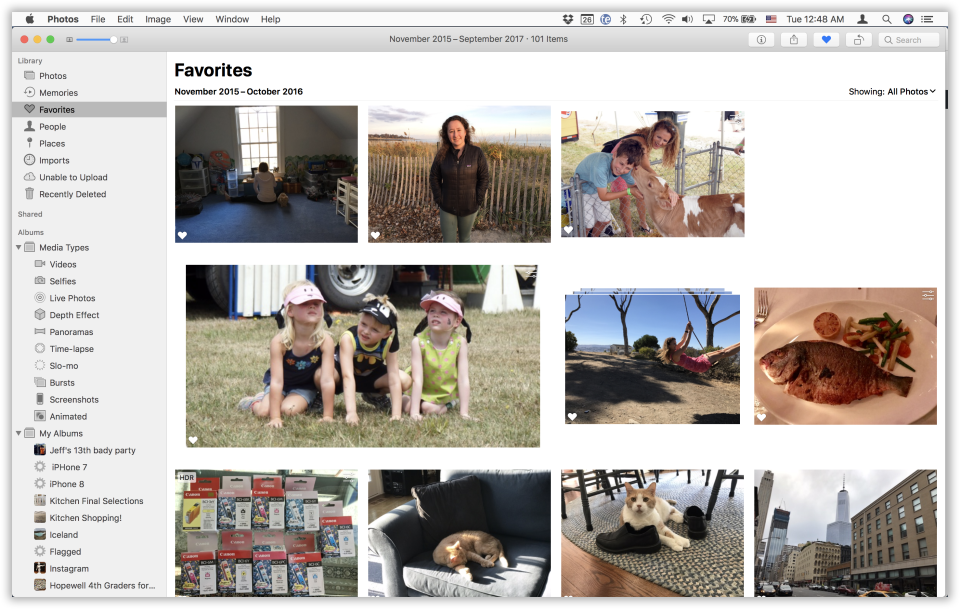 The redesigned Photos has a cleaner, well organized sidebar at left.