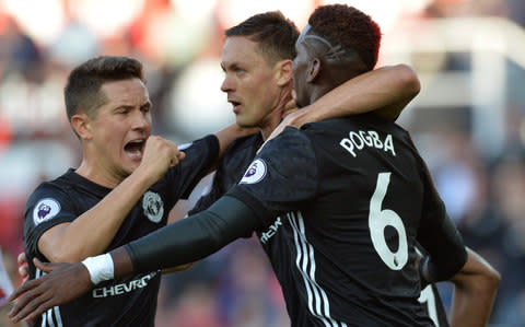 Ander Herrera celebrates with his teammates - Credit: Peter Powell/Reuters