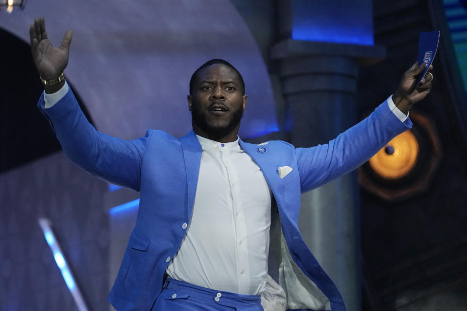 Zaire Franklin of the Indianapolis Colts walks on stage to announce a pick for the Indianapolis Colts during the second round of the NFL football draft, Friday, April 26, 2024, in Detroit. (AP Photo/Jeff Roberson)