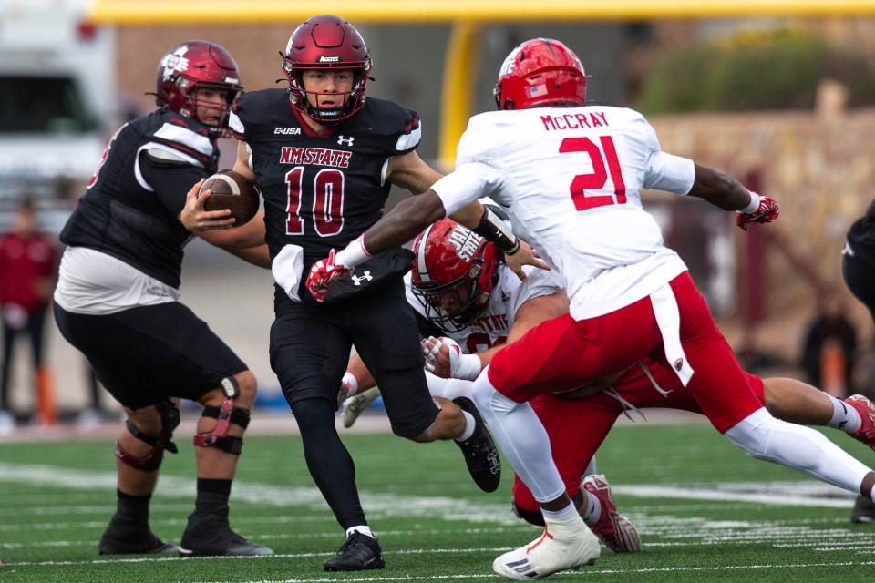 NMSU quarterback Diego Pavia runs the ball during a NMSU football game on Wednesday, Nov. 25, 2023, at the Aggie Memorial Stadium.