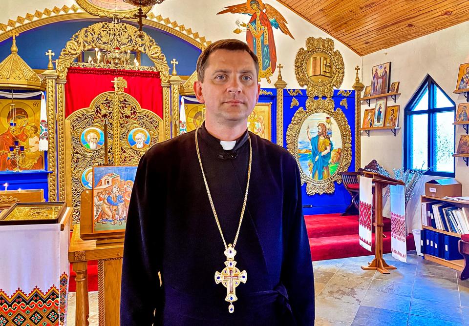 The Rev. Stepan Bilogan, a native of Ukraine, stands in the sanctuary of St. Mary's Ukrainian Orthodox Church in Jones, where he is pastor.