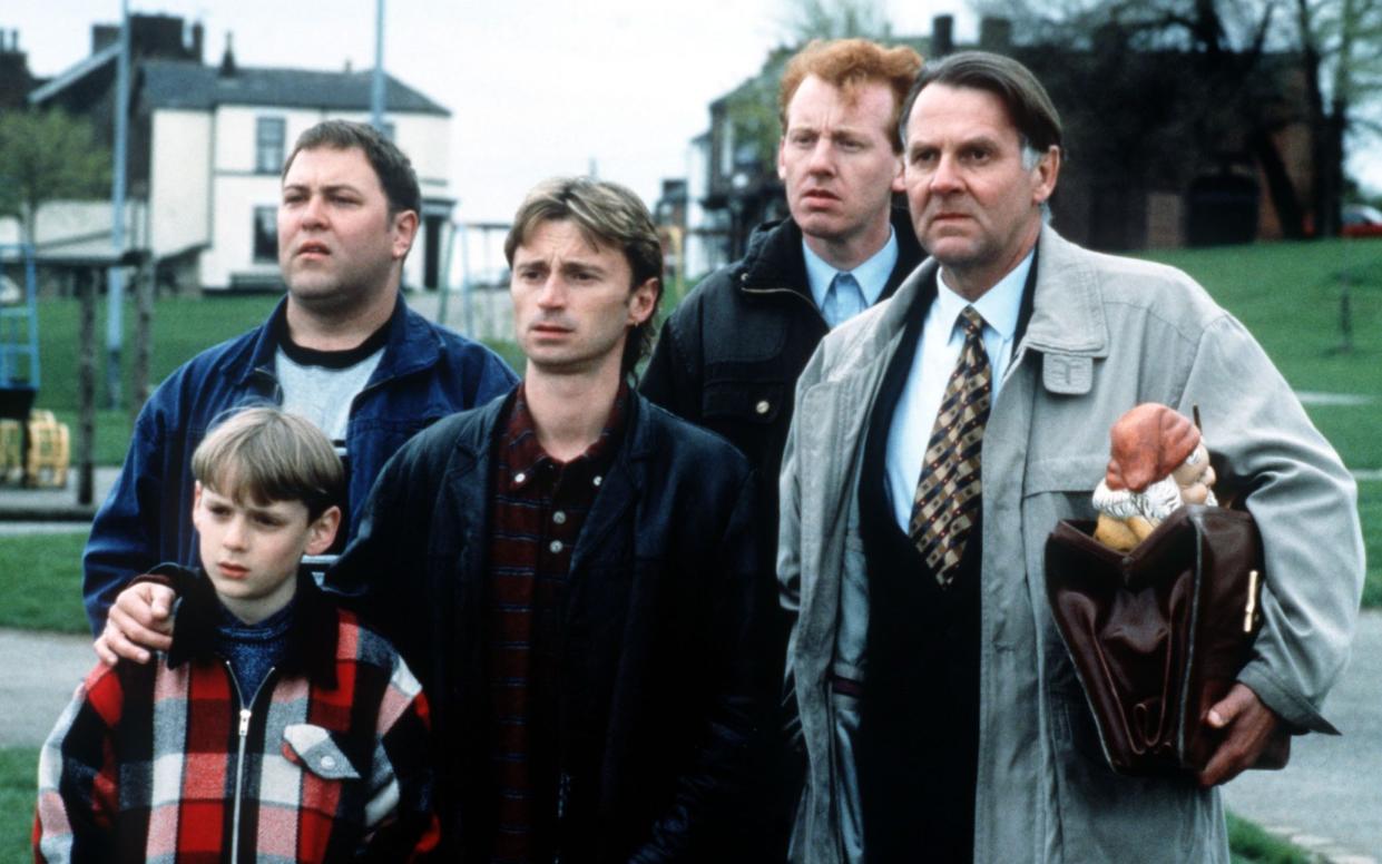 Tom Wilkinson, right, as Gerald Cooper in The Full Monty with (l-r) William Snapen as Nathan, Mark Addy as Dave, Robert Carlyle as Gaz and Steve Huison as Lomper