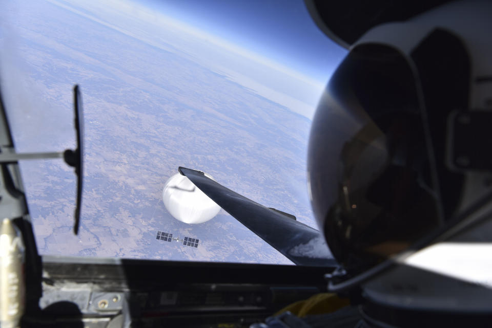 FILE - In this image released by the Department of Defense on Feb. 22, 2023, a U.S. Air Force U-2 pilot looks down at a suspected Chinese surveillance balloon as it hovers over the United States on Feb. 3, 2023. (Department of Defense via AP, File)