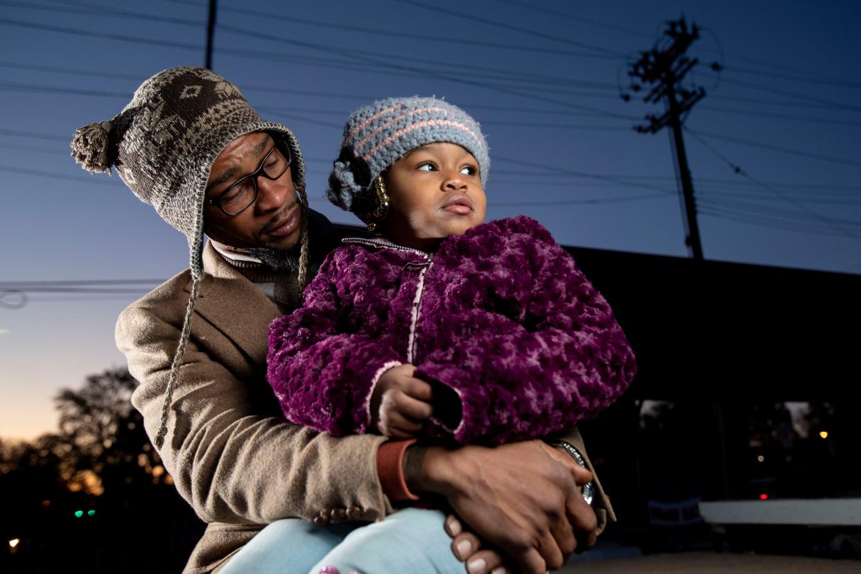 Keland Nance talks to his granddaughter, Nautica Powell, 3, on Tuesday, Nov. 12, 2019, at his property on the corner of Florida Street and East Mallory Avenue in Memphis. Nance's daughter, Jermeisha Nance, was killed in a shooting on Nov. 7.