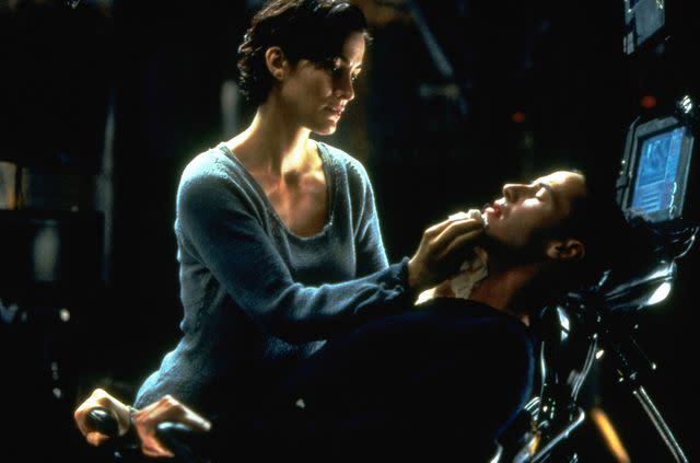 Ronald Siemoneit/Sygma Carrie-Anne Moss and Keanu Reeves in 'The Matrix,' 1999