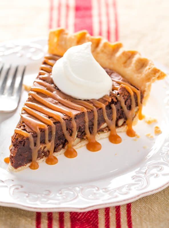 <p>Cooking Classy</p><p>Two favorite desserts in every forkful.</p><p><strong>Get the recipe: <a href="https://www.cookingclassy.com/brownie-pie/" rel="nofollow noopener" target="_blank" data-ylk="slk:Brownie Pie;elm:context_link;itc:0;sec:content-canvas" class="link rapid-noclick-resp">Brownie Pie</a></strong></p><p><strong>Related: <a href="https://parade.com/845062/nettiemoore/top-16-best-brownie-recipes/" rel="nofollow noopener" target="_blank" data-ylk="slk:16 Best Brownie Recipes;elm:context_link;itc:0;sec:content-canvas" class="link rapid-noclick-resp">16 Best Brownie Recipes</a></strong></p>