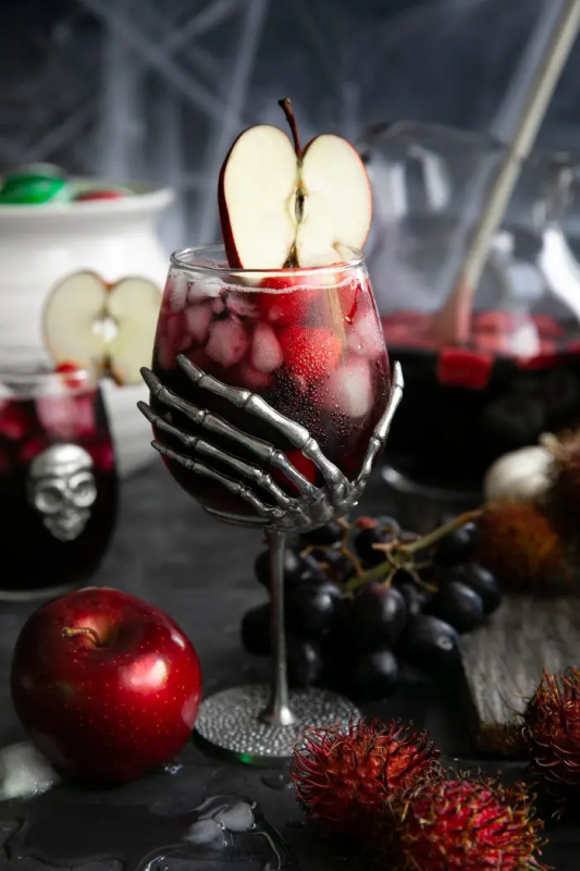 <p>The Forked Spoon</p><p>For wine lovers, consider a cocktail made with red wine, vodka, raspberry liqueur, apple cider, and fresh fruit topped with bubbly soda.</p><p><strong>Get the recipe: <a href="https://theforkedspoon.com/halloween-sangria/" rel="nofollow noopener" target="_blank" data-ylk="slk:Halloween Sangria;elm:context_link;itc:0;sec:content-canvas" class="link ">Halloween Sangria</a></strong></p>