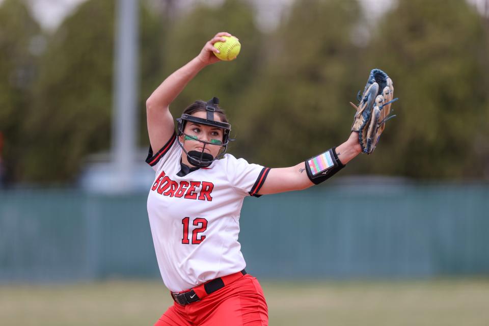 Borger’s Natalie Chisum (12) pitches the ball in a District 4-4A game against Pampa, Tuesday, March 21, 2023, at Borger High School Softball Field in  Borger.  Pampa won 11-1.