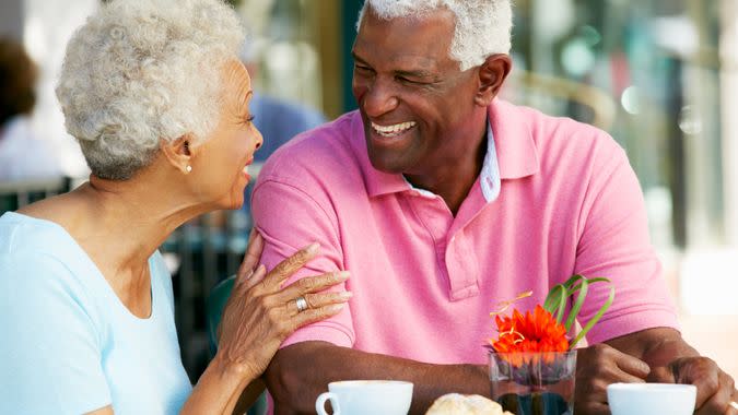 Elderly couple sitting at a cafe