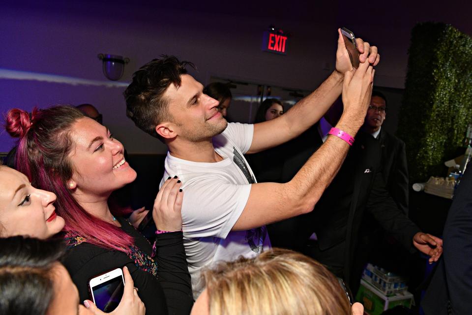 Tom Schwartz poses with fans at the “Vanderpump Rules” after-party at Hammerstein Ballroom in New York City on Saturday, November 16, 2019.