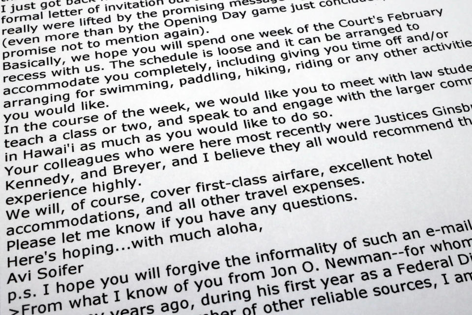 An email from April 5, 2010, to Supreme Court Justice Sonia Sotomayor about teaching at the University of Hawaii law school, is photographed, July 10, 2023. For decades, the law school has marketed its "Jurist-In-Residence" program to the Supreme Court as an all-expense-paid getaway, with the upside of considerable "down time" in paradise. "Your colleagues who were here most recently were Justices (Ruth Bader) Ginsburg, (Anthony) Kennedy, and (Stephen) Breyer, and I believe they all would recommend the experience highly," the law school's then-Dean Aviam Soifer wrote in a 2010 email trying to draw Justice Sonia Sotomayor to the school in Honolulu. "We will, of course, cover first-class airfare, excellent hotel accommodations, and all other travel expenses."(AP Photo/Jon Elswick)