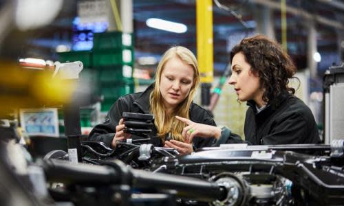 Workers at a Jaguar Land Rover factory.