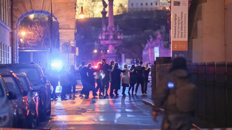 PHOTO: Students are being evacuated by police at the location of the shooting, Dec. 21, 2023, in Prague, Czech Republic.  (Gabriel Kuchta/Getty Images)