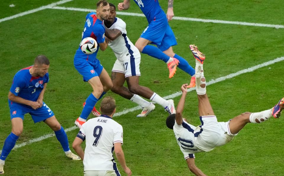 Jude Bellingham scores against Slovakia on June 30