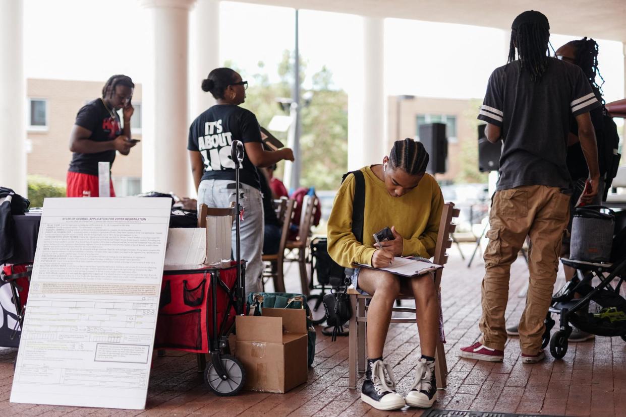 <span>A new national survey found that Black voters are defined by five specific clusters, not lumped into one bloc.</span><span>Photograph: Elijah Nouvelage/AFP/Getty Images</span>