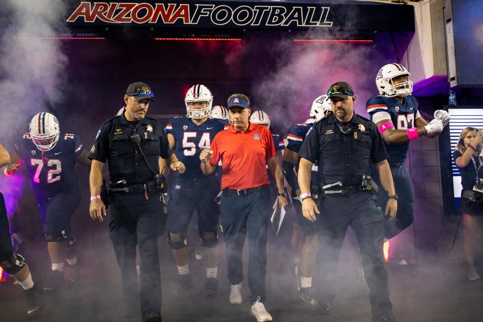 Could the Arizona Wildcats be the first school to leave the Pac-12 for the Big 12? One college football writer lists the university as an 'odds-on candidate' to do so.