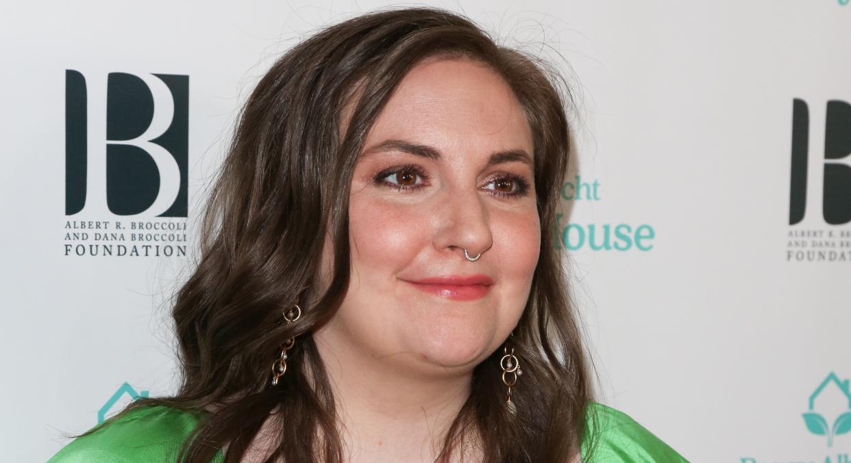 Lena Dunham has revealed how she was initially worried about her "insecurities" when asked to model in a London Fashion Week show [Image: Getty]